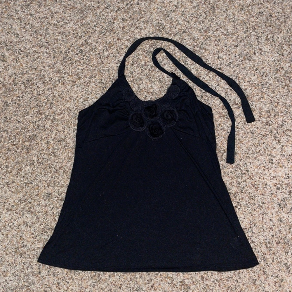 Black halter top with flowers at neckline